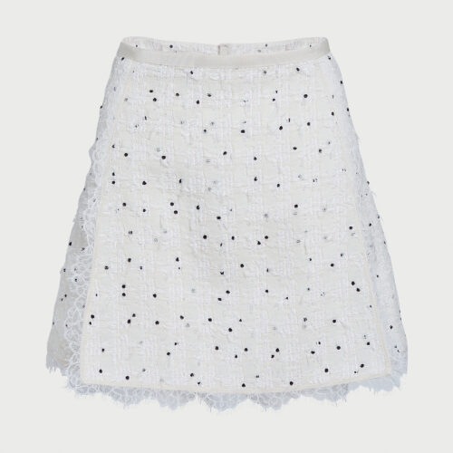 Short ivory skirt with black polka dots in bouclé